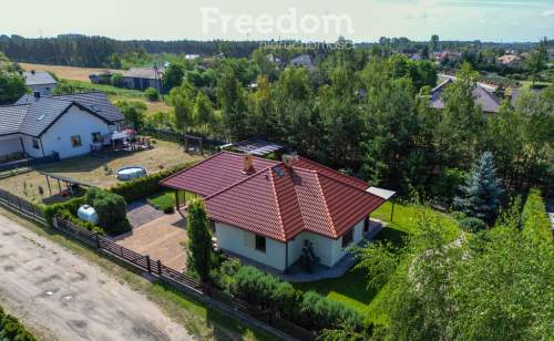 Parterowy dom z ogrodem i garażem 112,6 m