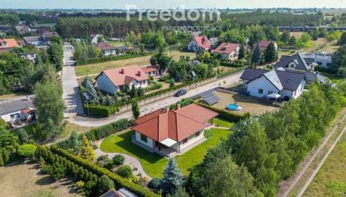 Parterowy dom z ogrodem i garażem 112,6 m
