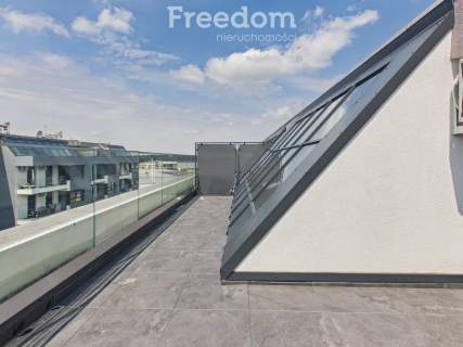 Dwupoziomowy apartament z antresolą 69.6 m2