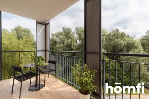 Nowoczesne mieszkanie balkon widok na zieleń
