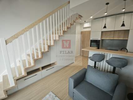 Rewal-elegancki apartament miejsce parkingowe.