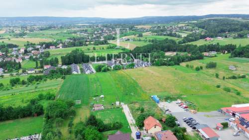 Działka mieszkaniowo-usługowa 16 arów przy DK94