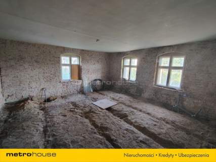 Bliźniak z potencjałem i działką 15 arów