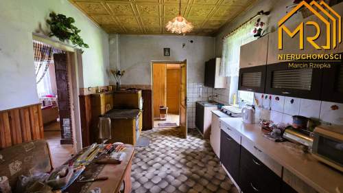Murowany dom między Tuchowem a Ryglicami