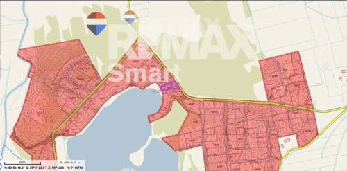 Działka budowlana z linią brzegową, Skolity