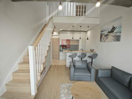 Rewal-elegancki apartament miejsce parkingowe.