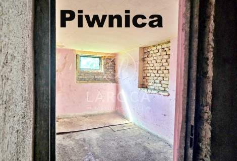 Wolnostojący z ogrodem piwnica garaż do remontu