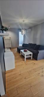 Słoneczny apartament Gdańsk klima deski dębowe