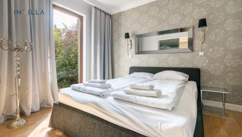 Komfortowy apartament z ogródkiem 800 m od plaży 
