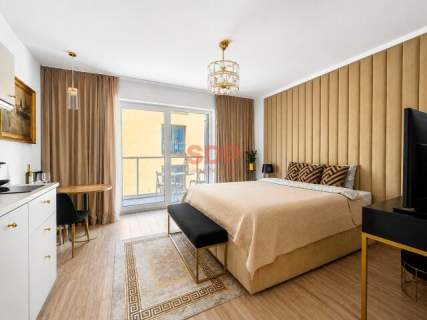 Małe mieszkanie w apartamentowcu przy Rynku przy rzece