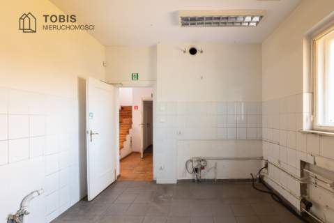 Dom pod działalność usługową lub mieszkalną
