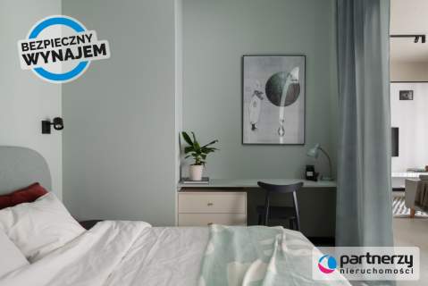 Designerskie mieszkanie z ogrókiem i halą garażową