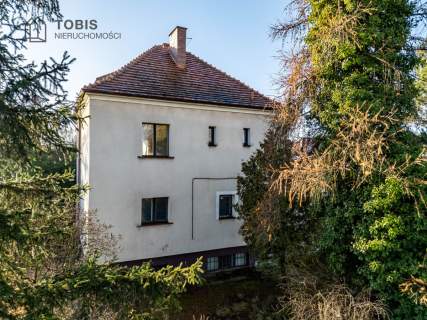 Dom pod działalność usługową lub mieszkalną