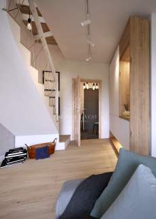 Słoneczny dwupoziomowy apartament z ogrodem i potencjałem