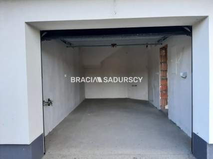 Nowoczesne domy w zabudowie bliźniaczej z garażem