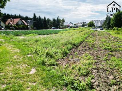 Działka budowlana 15 arów z obustronnym dojazdem