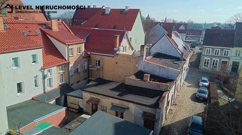 Mieszkanie plus działki w Pasłęku