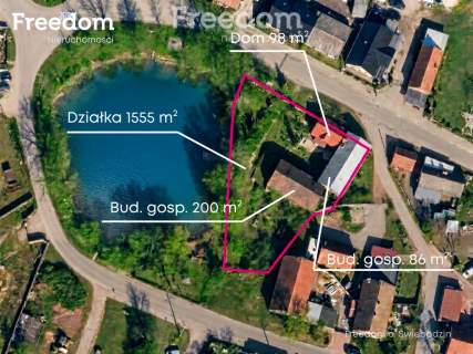 Dom, budynki gospodarcze i staw pod Świebodzinem