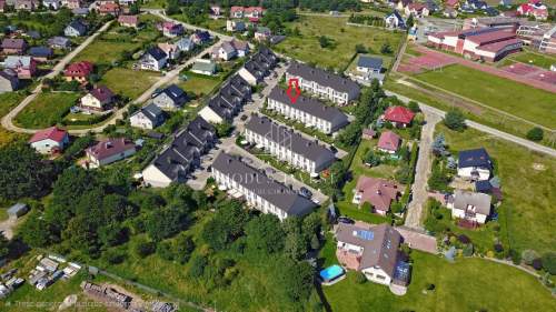 Słoneczny dwupoziomowy apartament z ogrodem i potencjałem