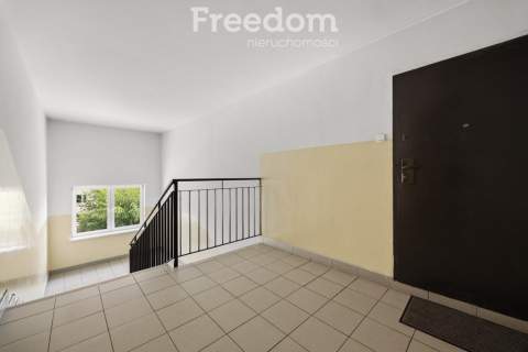 Dwupoziomowe mieszkanie z garażem i balkonem