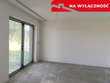 Nowy dom parterowy z antresolą.