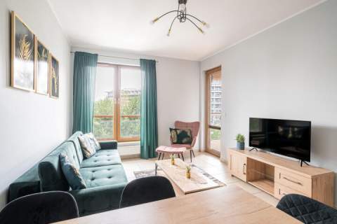 Ustawny, funkcjonalny apartament z dużym balkonem w pełni w