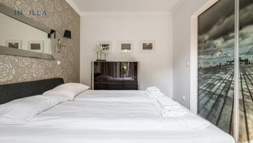 Komfortowy apartament z ogródkiem 800 m od plaży 