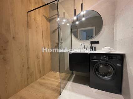 NOWY PIĘKNIE URZĄDZONY APARTAMENT Z OGRÓDKIEM 