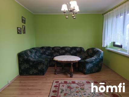 Wielopoziomowy dom z ogrodem i garażem   Mniszek