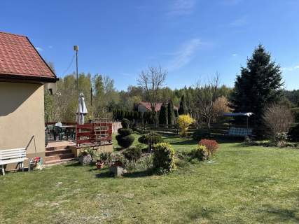 Dom z 2 lokalami, stawem i dużą działką, 1h od WWA