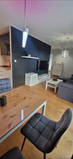 Słoneczny apartament Gdańsk klima deski dębowe