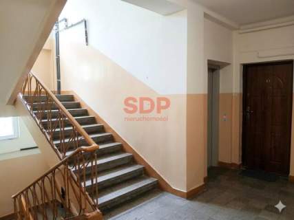 Dwa pokoje w pobliżu Manufaktury, blok z cegły