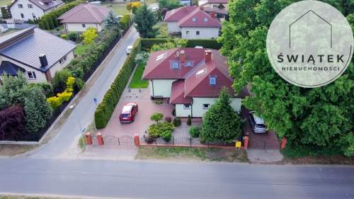 Przestronny dom z pięknym ogrodem i dużą działką