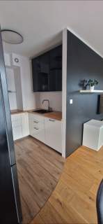 Słoneczny apartament Gdańsk klima deski dębowe