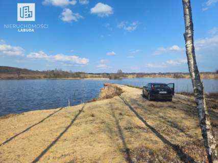 Działka nad jeziorem linia brzegowa, las, plaża