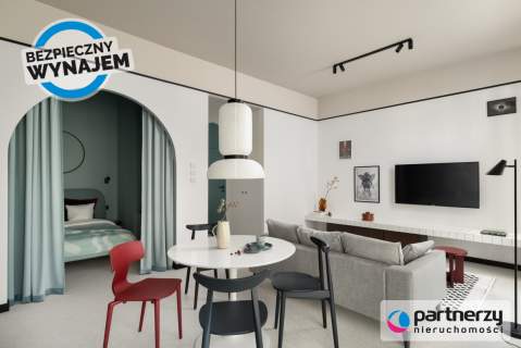 Designerskie mieszkanie z ogrókiem i halą garażową