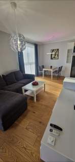 Słoneczny apartament Gdańsk klima deski dębowe
