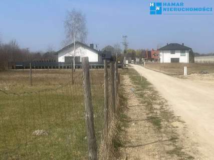 Działka 1199m2 dłuższym bokiem do drogi
