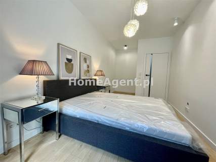 NOWY PIĘKNIE URZĄDZONY APARTAMENT Z OGRÓDKIEM 