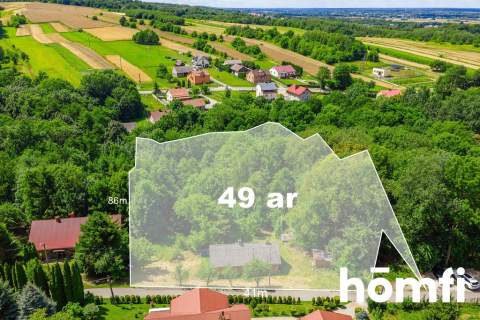 Drewniany dom na 49ar działce blisko Rzeszowa