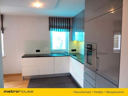 Apartament - 4 pokoje z garażem i balkonem