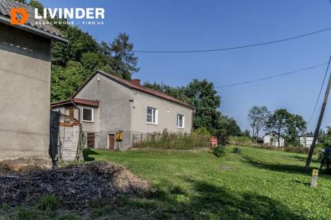 Dom z klimatem na 23-arowej działce Minoga 
