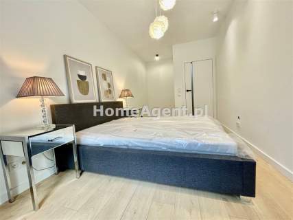 NOWY PIĘKNIE URZĄDZONY APARTAMENT Z OGRÓDKIEM 