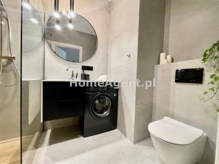 NOWY PIĘKNIE URZĄDZONY APARTAMENT Z OGRÓDKIEM 