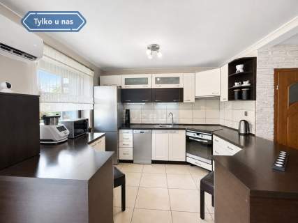 Wrzosowiak - dom w zabudowie bliźniaczej z dużą