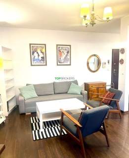 Salon z aneksem i sypialnia, balkon, garaż