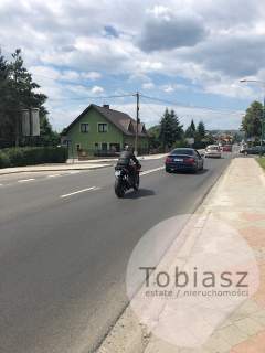 Magazyn, lokal handlowy przy głównej drodze