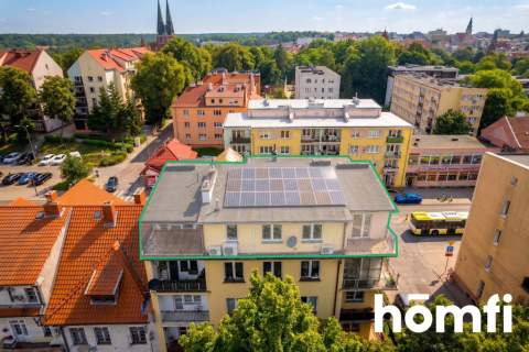 Penthouse z fotowoltaika i szklanym sufitem