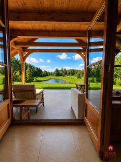 Drewniany dom premium nad stawem 1 ha Sauna