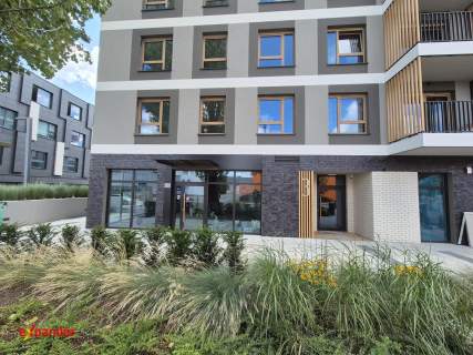 Lokal na Starym Mieście w apartamentowcu nad rzeką
